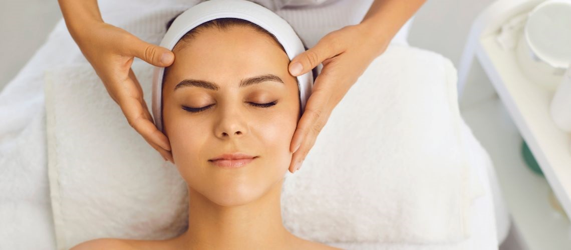 "Relaxed woman enjoying a self-care moment at EvolvMD MedSpa, highlighting the effortless glow and lifestyle benefits of the EvolvU Membership.