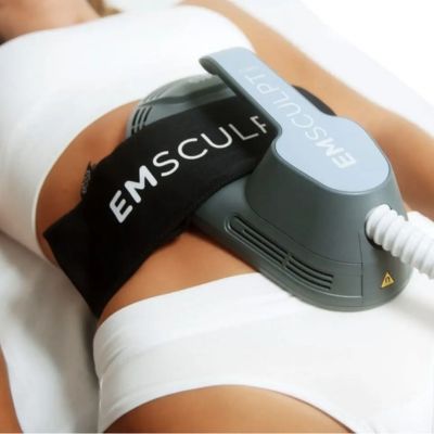 woman using emsculpt neo to burn fat milwaukee